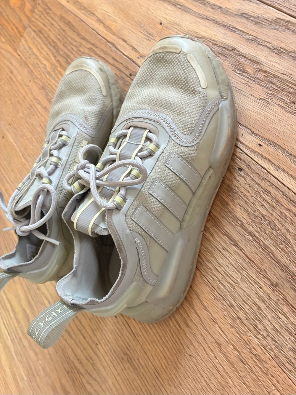 adidas womens Neutral Gray Athletic Sneakers with Subtle Yellow Trim
